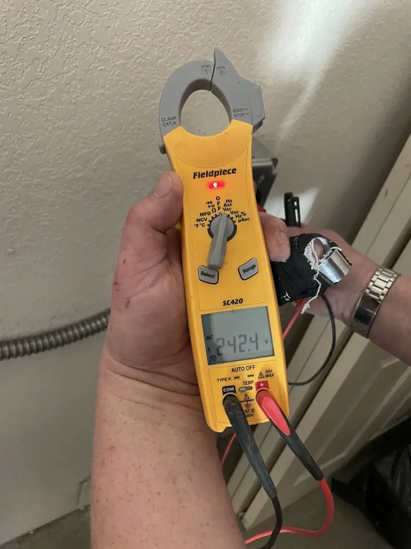 Voltage testing with clamp meter during Circuit Breaker Repair in Friona